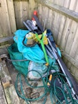 Lawn mower and garden waste Old lawnmower and strimmer. Old bits of wood. Old paddling pool and a garden umbrella GL53 - removed for £180