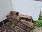 Cut up old wooden sleepers 3 cut up old reclaimed railway sleepers, plus a wooden deckchair. Easy access at the front. NW6 - removed for £104