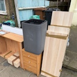 Wooden shelves, tabletop, bin A bunch of old furniture from a flat:
- old argos shelves
- small deck of drawers
- dry erase whiteboard
- ikea white tabletop about 150x80 (behind the whiteboard)
- large broken grey bin
- wooden pieces of ikea cube furniture
(shelves have paper with old number from failed pick up) N4 - removed for £110