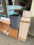 Wooden shelves, tabletop, bin A bunch of old furniture from a flat:
- old argos shelves
- small deck of drawers
- dry erase whiteboard
- ikea white tabletop about 150x80 (behind the whiteboard)
- large broken grey bin
- wooden pieces of ikea cube furniture
(shelves have paper with old number from failed pick up) N4 - removed for £110