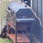 a large BBQ and small fountain It is a large BBQ and a small white fountain as the photos shows attached NW7 - removed for £78