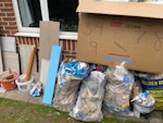 Builder waste and some cardboa About 12 builder bags, some cardboard as shown in the picture, and some wasted tiles. BR3 - removed for £130
