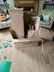 assorted junk/build waste cardboard boxes, garden chairs and junk, bagged builders waste, white shoe/toy storage E8 - removed for £188