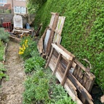 Timber and small amount of bri Old garden timber building on brick piers mostly rotted wood small amount of bricks some metal work roof felt and bagged waist as in photos. NW2 - removed for £186