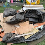 Disassembled wooden shed Disassembled wooden shed with associated materials, timber panels, boards, membrane sheeting, cardboard, and a few sections of artificial grass (rolled). One builder’s bag already filled with mixed items. All in the back garden. TW13 - removed for £296