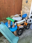 garden toys/ rubbish/ wheelbar mixed rubbish from the garden. garden toys, small kids bike, wheelbarrow. NW10 - removed for £117