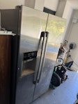 An American fridge/freezer and An American Fridge/Freezer 1.8m tall and thd cover of a medium sized hot tub. HA5 - removed for £130