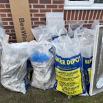 Builder waste 22 bags of tiles and plaster board debris , tall cabinet 2 bathroom cabinet and shower screen , toilet bowl and small wash basin BR3 - removed for £156