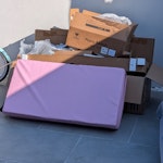 Cardboard boxes + folding matt Large and small cardboard boxes, and a folding matt E4 - removed for £52