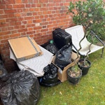 Rubbish. Wood carpet chair Couple trees one chair food bags and a carpet KT2 - removed for £100