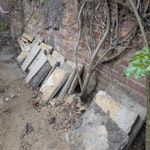 18 square slabs and some wood 18 square patio slabs, a small amount of wooden battens and a bag of rubble. TW1 - removed for £104