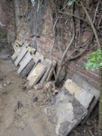 18 square slabs and some wood 18 square patio slabs, a small amount of wooden battens and a bag of rubble. TW1 - removed for £104