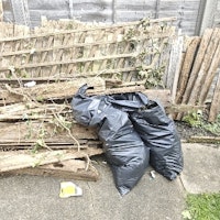 old fence and garden waste collected by fortknox waste