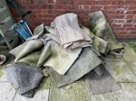 One pile of old carpet One pile of old carpet from a room sized (3.65m x 3.47m). Roughly sliced up and folded. Easy access through back gate to garden. DE55 - removed for £95