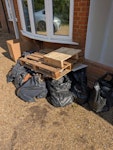 Mainly Rubble Around 23ish bags of rubble (not overfilled) pallets, card board, a small piece of metal flue and a few off cuts of plasterboard have been added since the pictures where taken. cheers GU6 - removed for £166