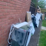 kitchen refit kitchen refit waste splash back and working dishwasher ect /cardbord worktop wood ect old units. all the pics are same waste different angle only one row of waste- was a narrow space so had to put it along wall and fence so people could get acsess. first pic shows while line of waste - is a small to medium ( this is loaded In medium van. IP14 - removed for £293