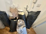 6 bags of rubbish with cushion W2 - removed for £57