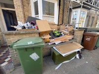Cardboard packaging and wood collected by Clear Away Junk