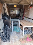 Furniture in garage 2 seat sofa
2x wardrobes (disassembled)
Dining table 
2x single mattresses
1x double mattresses
Chest of drawers 
2x bags of builders sand
Glass and chrome unit 
4x garden chairs HA9 - removed for £130