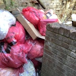 Rubbish removal Build-up of rubbish bags and cardboard LU1 - removed for £177