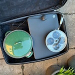 pond liner-tiles-printer-chest wooden chest, floor tiles, suitcase, old saucepans, plastic bins, 2 curtain poles, old fashioned kitchen scales, printer, flexible pond liner (sheeting) in heavy duty waste bag, very small amount of brick/stone (poss 4 or 5) TW1 - removed for £110