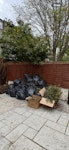 Garden waste in bags I have approximately 20 bags (80L size) plus one large and one small box of green waste ready for collection.

Content: Mostly grass clippings, weeds, and some small branches.

Packaging: All waste is contained in Sainsbury's green waste bags (or the boxes, see in photo)
Access: The bags are currently piled in the back garden but I will bring them to the front garden, just down the steps for easy access.

Timing: Looking for the quickest possible collection, flexible on timing. SW5 - removed for £130