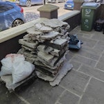 Concrete This is a broken up concrete base, average 50mm thick. I've broken into small manageable squares. SW2 - removed for £123