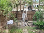 Rubble, wire & wooden items 5x bags rubble; pile of rubble; small ceramic pot; wooden trellis; 2 x wooden chairs; wooden post; chicken wire. SE26 - removed for £214