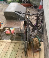 2 rusted bikes, one old BBQ, collected by Long Gone Waste Diposal