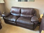 A 3 seater leather sofa We have a leather electric recliner 3 seater sofa.
They are very solid and heavy.
One cushion has moved and misshapen.
Sofa has signs of wear and tear plus scratches. WD3 - removed for £117