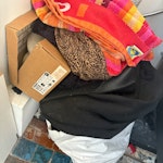 Textiles/pots/luggage etc 5 or so bags of textile recycling. An old suitcase, old pots, pans & chopping boards. A broken old fan, dead plant & pot. Empty dried tins. Old mdf cupboard doors
My flat is on the top (third floor without lift access) SE5 - removed for £130