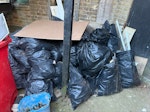 building rubbish building waste but very less quarter of skip SE26 - removed for £130