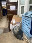 Wardrobe, bin bag & cardboard The wardrobe can come to pieces W4 - removed for £95