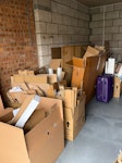 Cardboard packages mixed waste Half flattened Cardboard and some packages and small mixed waste SK7 - removed for £91