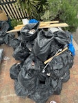 broken tiles toilet and sink I have approximately 25 - 30 bags of broken tiles removed from bathroom, old toilet and old vanity unit along with its small wooden cabinet, one medium size wooden door and few other wooden furnishings EN11 - removed for £219