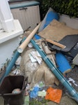Builders waste There's a solid, single bed base, a sheet of plywood and then maybe 5 rubble bags a few small broken wooden outdoor items (a chair, a toddler bike, etc) There are two rooms worth of carpet and underlay as well as quite a lot of carboard. There are various pieces of building waste, such as leftover plaster moulding. 

The shed in the back is not included in the waste. N5 - removed for £296