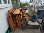 Dismantled shed & other stuff Dismantled wooden shed, bookcase, mortar, sand, floor tiles, plant pots, cardboard WD23 - removed for £143