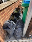 garden rubble, cardboard 4 bags of garden rubble, mostly earth and stones; and a large pile of cardboard packaging too long to go in a car TW12 - removed for £83