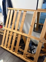 broken wooden bed frame collected by MWT waste Ltd