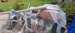 Various goods. Various chrome tables with glass tops/office chair/ window blind and curtain rails.household goods. Old clock, Bags/boxes with various goods. Speaker stands.All on rear patio B77 - removed for £156