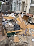 Light building waste , timber Mostly timber, ply, plastic paper, bags of light weight building rubbish , skimming material waste , paving stones and bricks will stay E7 - removed for £271