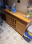 Side cabinet with wine storage It is a brilliant cabinet. All it needs is a sand/varnish and can easily be resold. DA4 - removed for £32