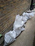 Cardboard boxes. 7 bags rubble Cardboard boxes as pictured (will be moved to front of property driveway for collection)

7 bags of rubble (stones, rocks and garden clearance) accessible via side return.

Feel free to quote separately for each of these SE22 - removed for £141