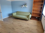 Old + broken 3 seater sofa Old green 3 seater sofa, but broken. Two of the legs are no longer in working condition as the wood they screw into has snapped away from the sofa frame. It is also weathered from use and darker in patches from previous stains. SO30 - removed for £99