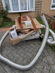 Old Fireplace Old Fireplace and back boiler old liner and general waste. The fireplace is a 2 man lift. GU2 - removed for £123