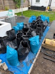 bags of soil and garden waste 45 bags of soil (roughly just over half full each)
1 large bag containing a very small amount of loose rubble,  old weed membrane, some carpet, broken garden fork etc

easy access through side passage to the front, where parking is free. there are 3 or 4 very shallow steps on the footpath. SE19 - removed for £314