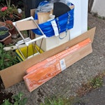 mostly wood and plastic undersink cabinet,wood,plastic containers laminet flooring CR0 - removed for £47