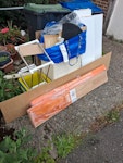 mostly wood and plastic undersink cabinet,wood,plastic containers laminet flooring CR0 - removed for £47