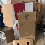 Cardboard, clothing rail X2 Several cardboard boxes, flattened, plus a disassembled bamboo clothing rail, and a metal Ikea rail, also disassembled. N5 - removed for £110