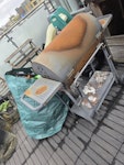 bags of waste barbeque bags of rubbish, garden waste, old barbecue, kids picnic benches, old bits of wood and old deckchairs N1 - removed for £130